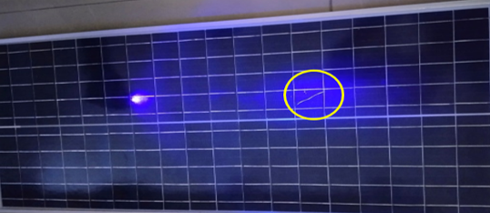 Photo (iii)b: Crack in PV module found in Ultraviolet Fluorescence Testing